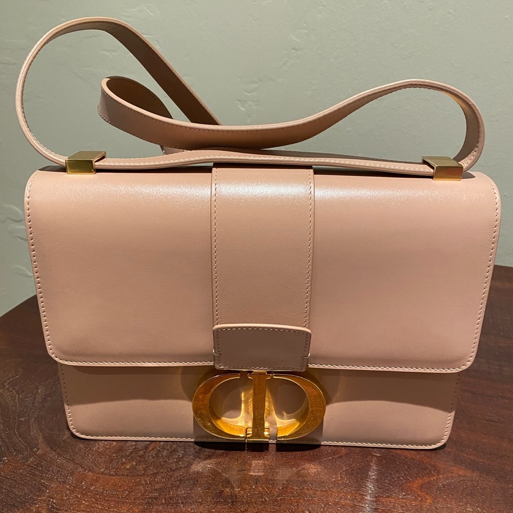 The 30 Montaigne line crafted in pink calfskin for an elegant and modern design.